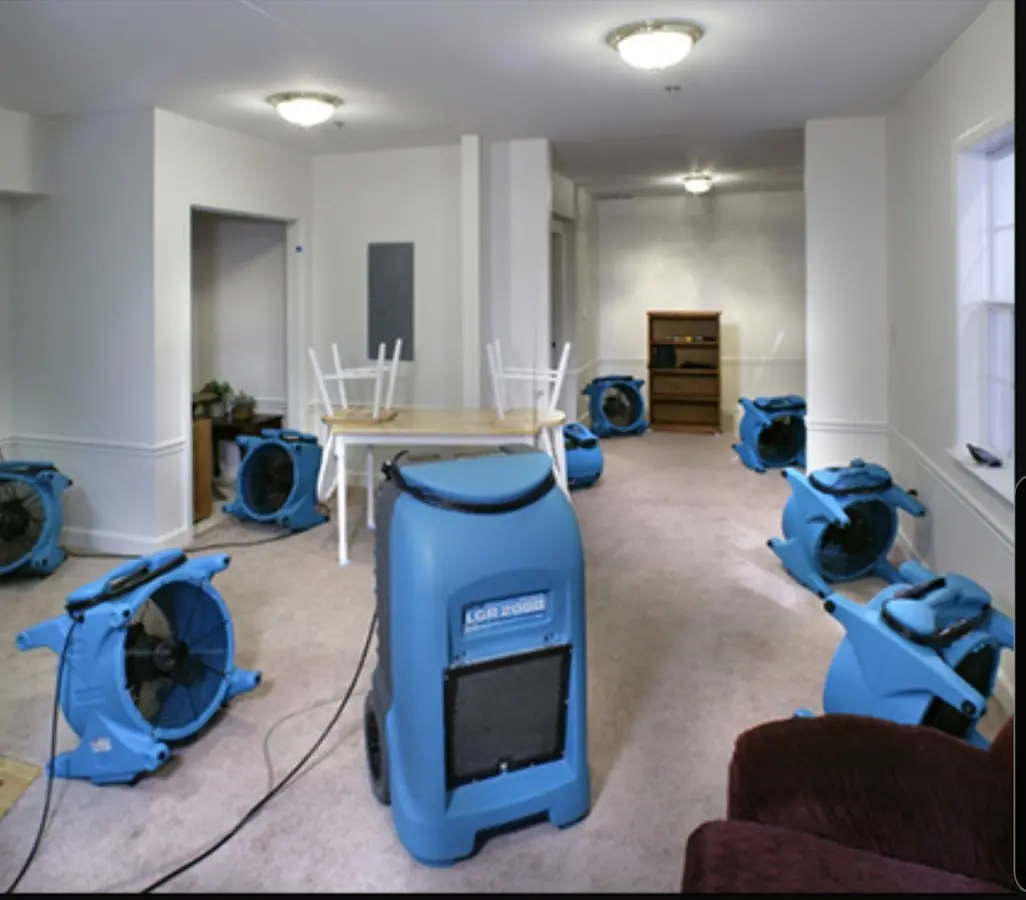 Air movers and dehumidifier setup for Water Damage Restoration in Yreka